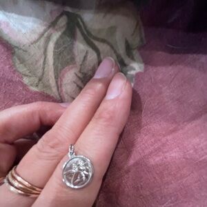 14 k saro marked white gold cherub charm- guardian angel.